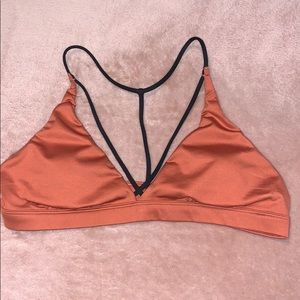 A burnt orange Bikini top